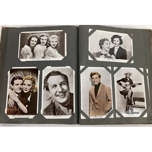 186 - A vintage postcard album containing a collection of film studio black and white and coloured photogr... 