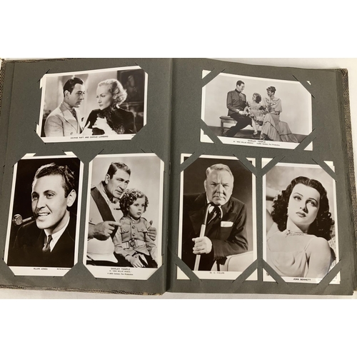 186 - A vintage postcard album containing a collection of film studio black and white and coloured photogr... 