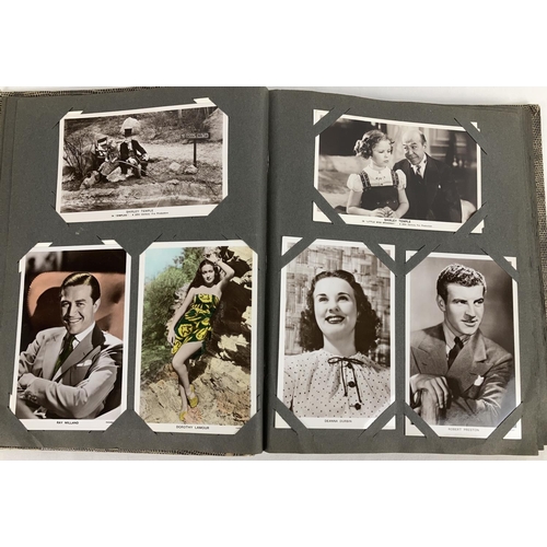 186 - A vintage postcard album containing a collection of film studio black and white and coloured photogr... 