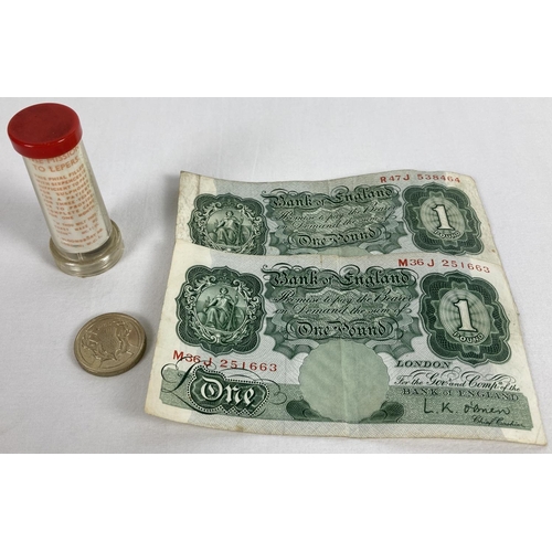 49 - A small collection of vintage British bank notes and coins. To include: 2 x L.K. O'Brien £1 notes (M... 