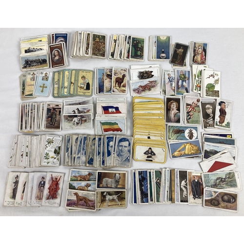 200 - A collection of assorted early to mid 20th century cigarette card sets & part sets. To include examp... 