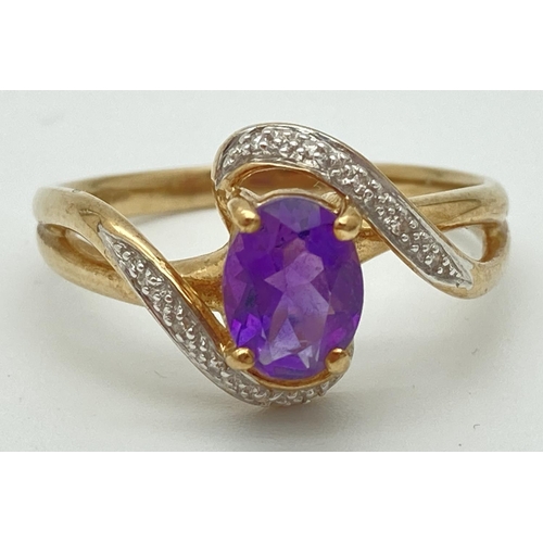 1044 - A 9ct gold, amethyst and diamond dress ring with twist style setting. Central oval cut amethyst (app... 