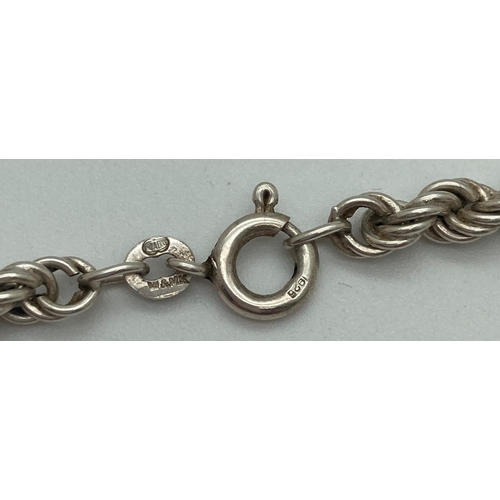 1064 - A 20 inch silver rope chain with spring clasp. Approx 12.2g total weight.