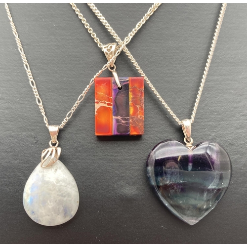 1092 - 3 natural stone pendants on 925 silver chains. To include a fluorite heart shaped pendant stamped 92... 