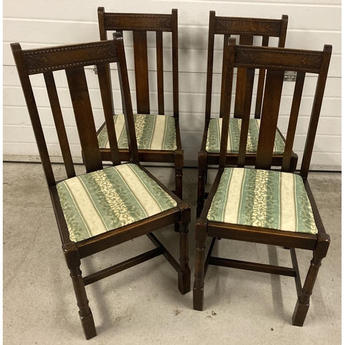 1420 - A set of 4 dark oak 1940's high backed turned legged dinning chairs. With re upholstered seats. Carv... 