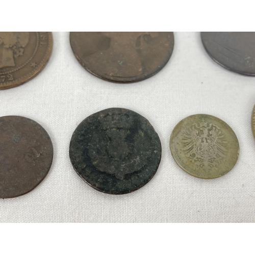 1224 - A small collection of antique coins in varying conditions. To include: Charles II copper Bawbee, Geo... 