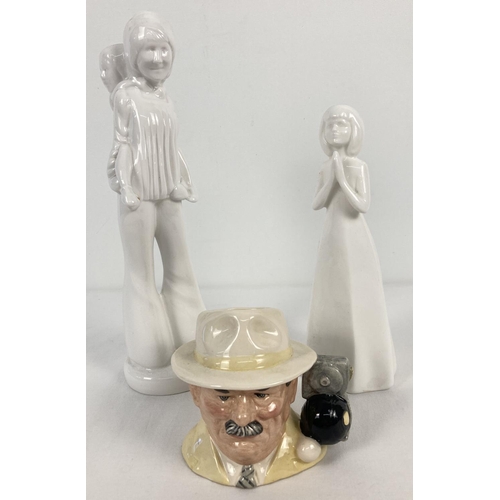 1264 - 2 modern ceramic blanc de chine figurines together with a Royal Doulton 