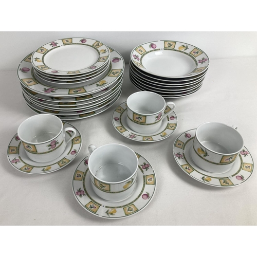 1267 - A quantity of modern ceramic dinnerware by Royal Norfolk, with floral & fruit pattern. Comprising: 8... 