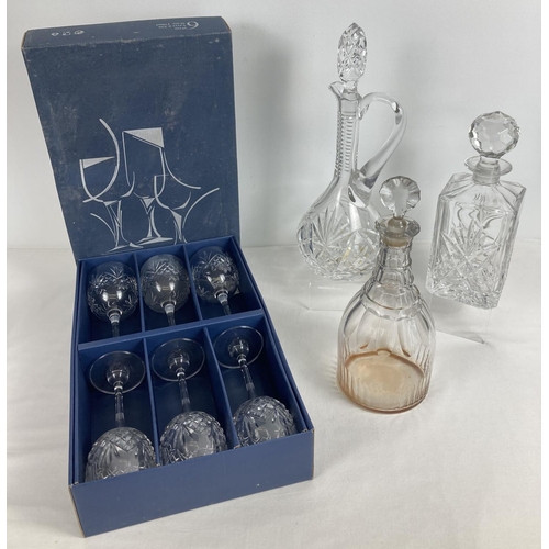 1297 - 3 modern and vintage clear cut glass decanters with stoppers. Together with a boxed set of 6 Bohemia... 