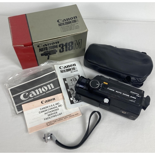 1331 - A boxed vintage Canon Auto Zoom 318M cine camera complete with instructions. Original paperwork, rec... 