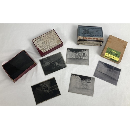 1332 - A small collection of assorted vintage glass photographic slides.