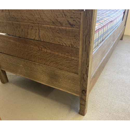 1435 - A vintage solid oak single four poster bed with flat head and base board, canopy and carved finials.... 