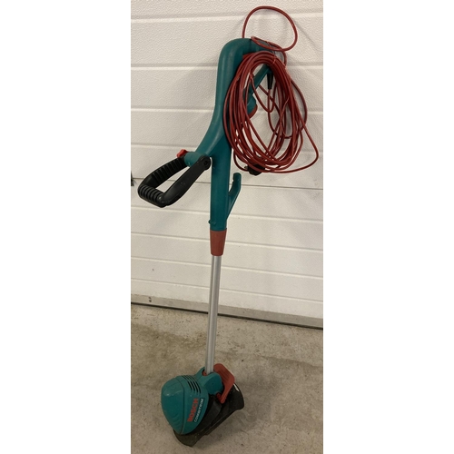 1431 - An electric Bosch Art26 Combitrim garden strimmer. Not tried & tested.