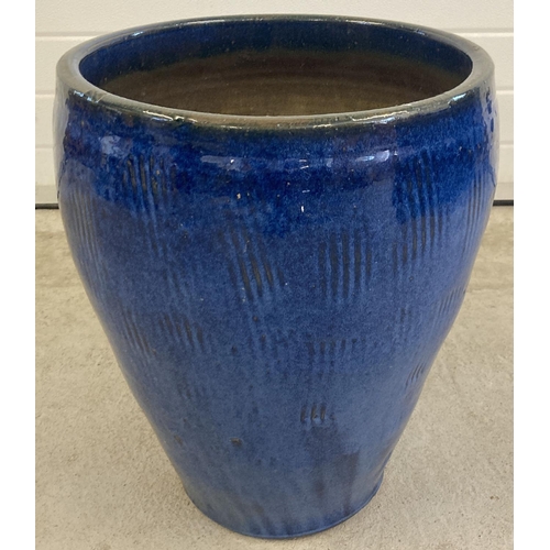 1408 - A large blue glazed ceramic garden planter, approx. 52cm tall x 41cm diameter.