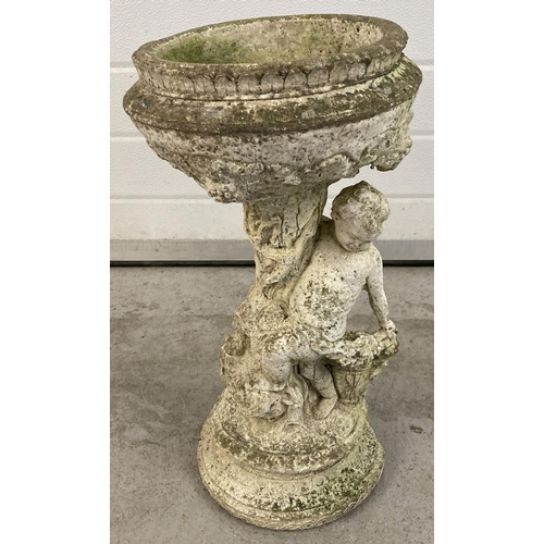 1416 - A vintage concrete garden bird bath with cherub design pedestal. Approx. 50cm tall x 27cm diameter.