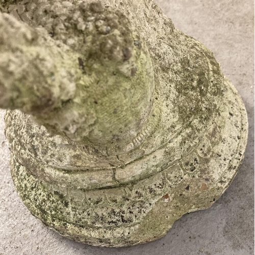 1416 - A vintage concrete garden bird bath with cherub design pedestal. Approx. 50cm tall x 27cm diameter.