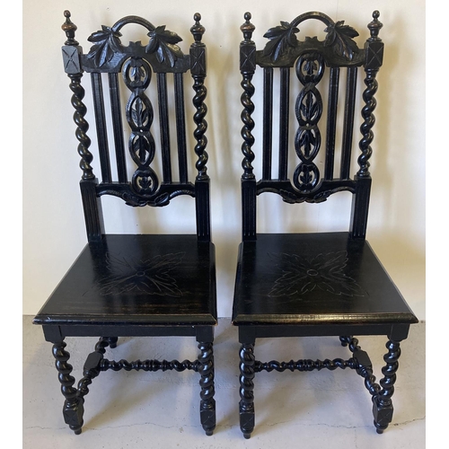 1447 - A pair of Victorian carved dark oak barley twist hall chairs. With foliate carved detail to backs, t... 