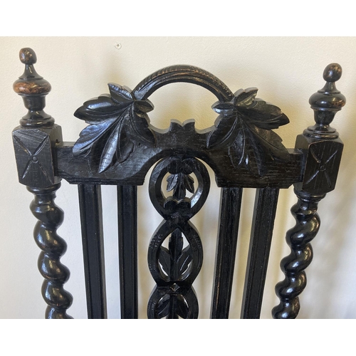 1447 - A pair of Victorian carved dark oak barley twist hall chairs. With foliate carved detail to backs, t... 