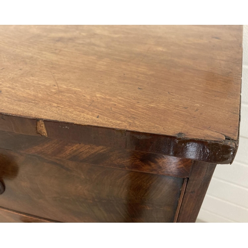 1449 - A Victorian mahogany bow fronted 2 over 3 chest of drawers with knob handles. Brass escutcheons to e... 