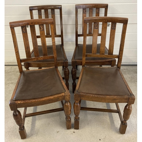 1456 - A set of 4 dark oak early 20th century dining chairs with slatted backs, carved detail & acorn desig... 