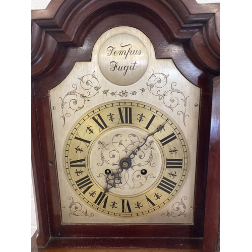 1263 - A vintage mahogany cased Tempus Fugit Grandmother clock with shaped top. Engraved detail to metal fa... 