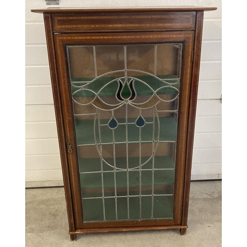 1460 - A Victorian mahogany display cabinet with leaded stained glass door& inlaid detail. 3 interior baize... 