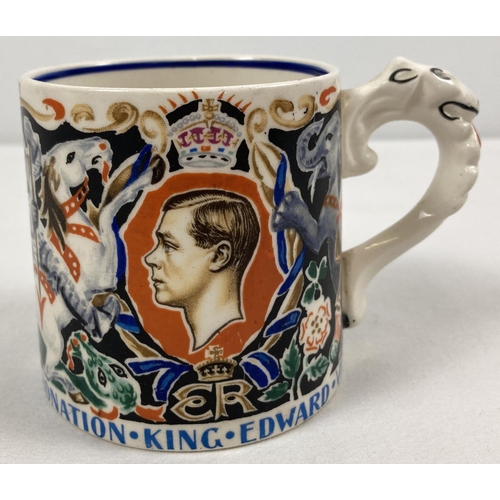 1290 - A 1937 King Edward VIII Coronation mug designed & modelled by Dame Laura Knight. Approx. 8.5cm tall.