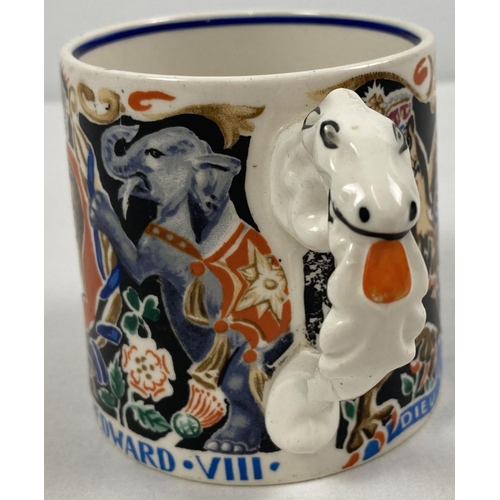 1290 - A 1937 King Edward VIII Coronation mug designed & modelled by Dame Laura Knight. Approx. 8.5cm tall.