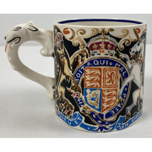 1290 - A 1937 King Edward VIII Coronation mug designed & modelled by Dame Laura Knight. Approx. 8.5cm tall.