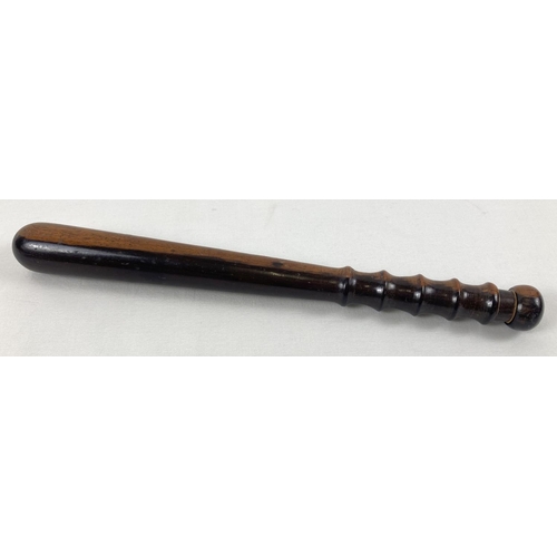 1357 - A vintage hardwood truncheon with ribbed handle, approx. 38cm long.