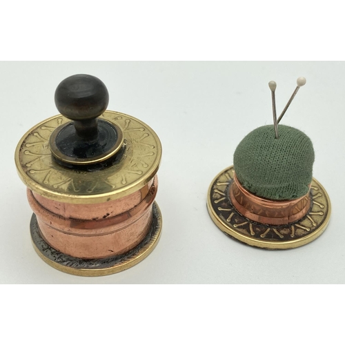 1232 - 2 small novelty items made from brass and copper fixings and old coins. A lidded trinket/pill box to... 