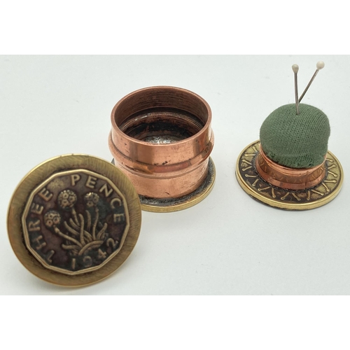 1232 - 2 small novelty items made from brass and copper fixings and old coins. A lidded trinket/pill box to... 