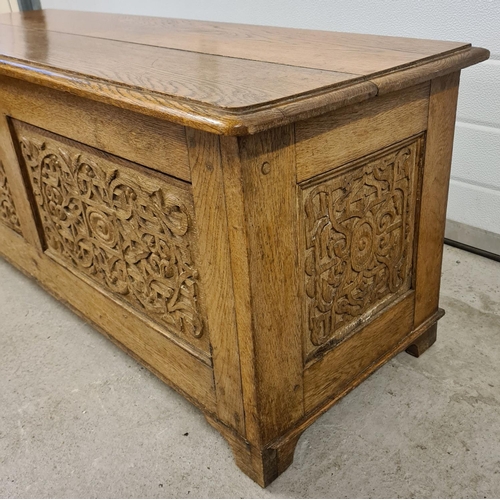 1468 - A vintage medium oak linen chest with decorative carved panel detail to front & sides. Approx. 46cm ... 