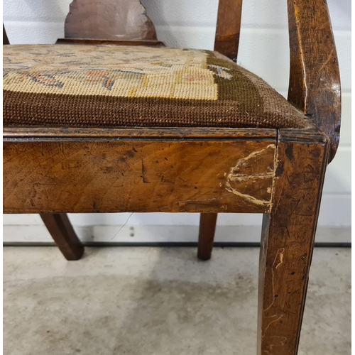 1475 - A Georgian walnut carver armchair with square legs, shaped back & back panel and needlepoint upholst... 