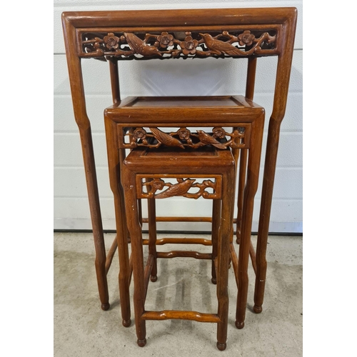 1483 - A set of 3 Oriental carved nesting tables with shaped legs and cherry blossom and bird pierced work ... 