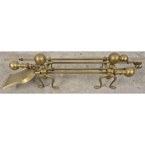 1246 - A set of vintage brass fire irons with matching fire dogs. Comprising: poker, shovel and tongs, all ... 