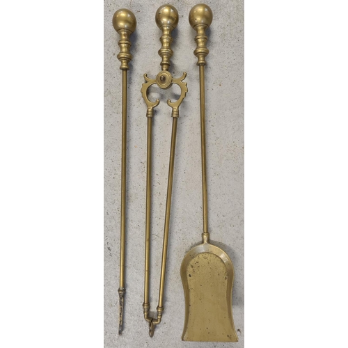 1246 - A set of vintage brass fire irons with matching fire dogs. Comprising: poker, shovel and tongs, all ... 