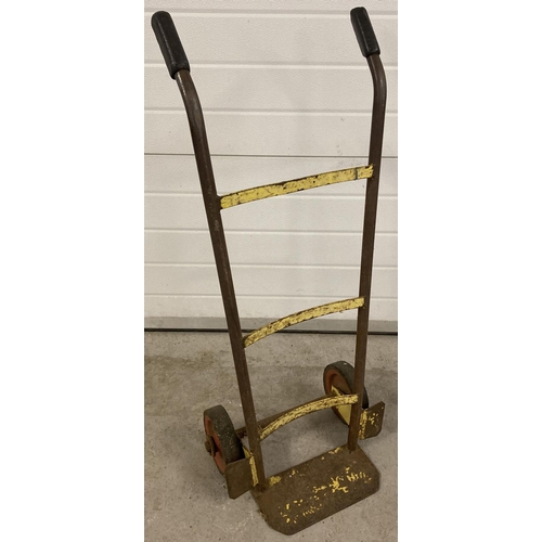 1418 - A vintage metal sack barrow, originally painted yellow, with rubber grip handles and wheels. Approx.... 