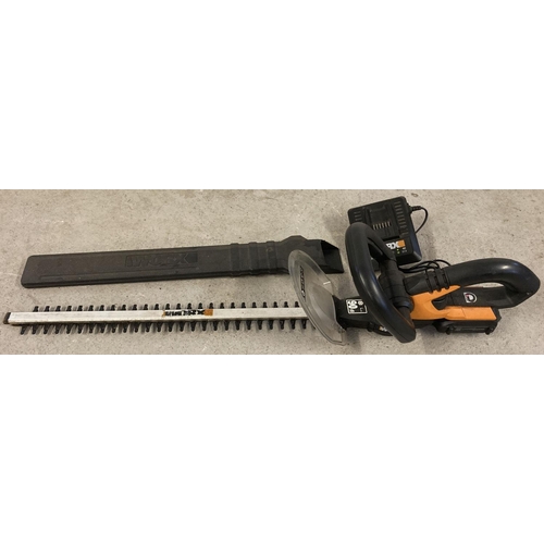 1419 - A Worx WA3512 18V rechargeable hedge trimmer with charger, battery and blade cover.