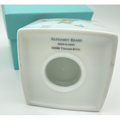 1293 - A boxed Tiffany & Co 2006 Alphabet Bears square ceramic money box. Approx. 8.5 cm tall.