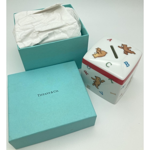 1293 - A boxed Tiffany & Co 2006 Alphabet Bears square ceramic money box. Approx. 8.5 cm tall.