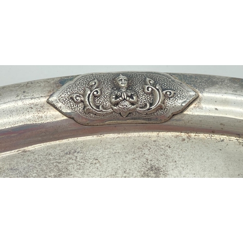 1200 - A Sterling silver oval shaped pin tray with oriental deity decoration to four sides. Back marked 