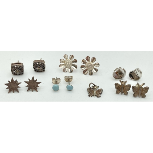 1063 - 6 pairs of silver, white metal and costume jewellery stud style earrings together with a small butte... 