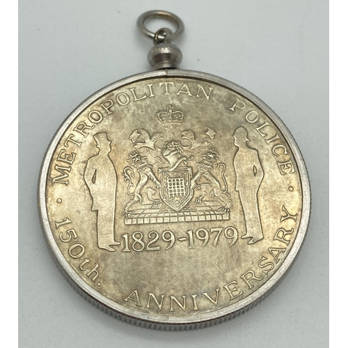 1229 - A Metropolitan Police 150th Anniversary coin/medallion in a white metal mount with necklace hanging ... 