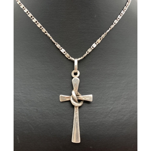 1079 - A large vintage 925 silver cross shaped pendant on a 20