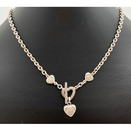 1084 - A Kit Heath 925 silver Rennie Mackintosh design necklace with heart shaped pendants and toggle clasp... 