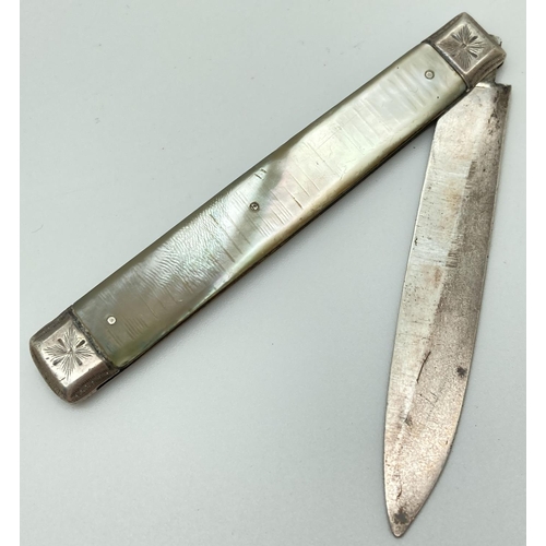 1206 - A Georgian silver bladed mother of pearl handled pocket fruit knife. Hallmarked to blade, approx. 8.... 