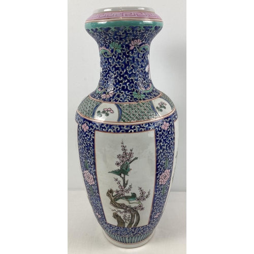 1307 - A finely painted large blue ground Chinese floor vase. With 4 panelled design featuring Chinese bird... 