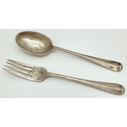 1213 - An early 20th century child's silver fork and rat tail spoon set. Both hallmarked to reverse of hand... 