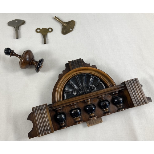 1256 - An antique wooden cased wall clock with turned finial & column detail and RA pendulum. Glass panelle... 